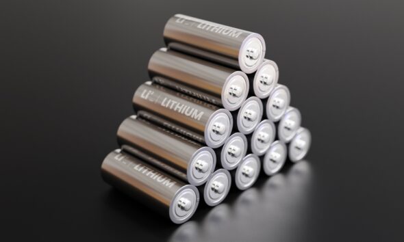 A,Pile,Of,Lithium,Batteries,With,Dark,Background