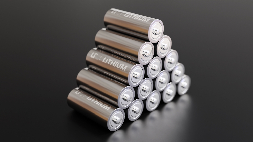A,Pile,Of,Lithium,Batteries,With,Dark,Background