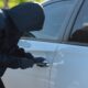 Close-up,Man,Dressed,In,A,Black,Holding,Screwdriver,To,Break