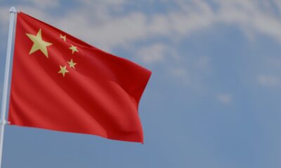 Close-up,Wavy,China,Flag,And,Blue,Sky