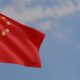 Close-up,Wavy,China,Flag,And,Blue,Sky