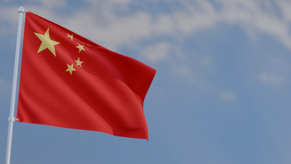 Close-up,Wavy,China,Flag,And,Blue,Sky