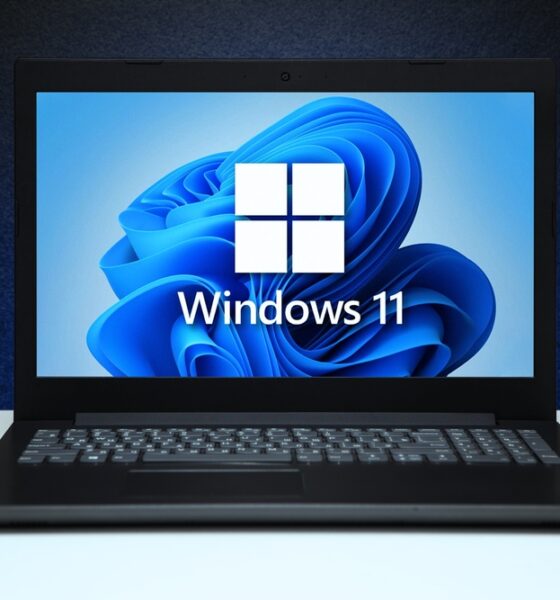 Windows,11,Logo,On,The,Screen,Laptop,Computer,On,Black