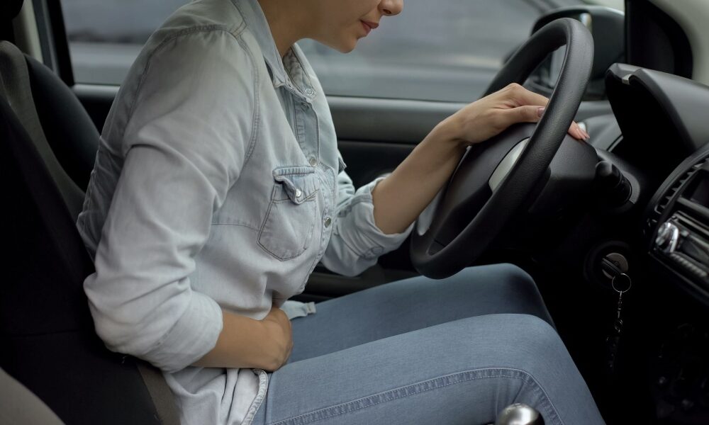 Stomach ache in car